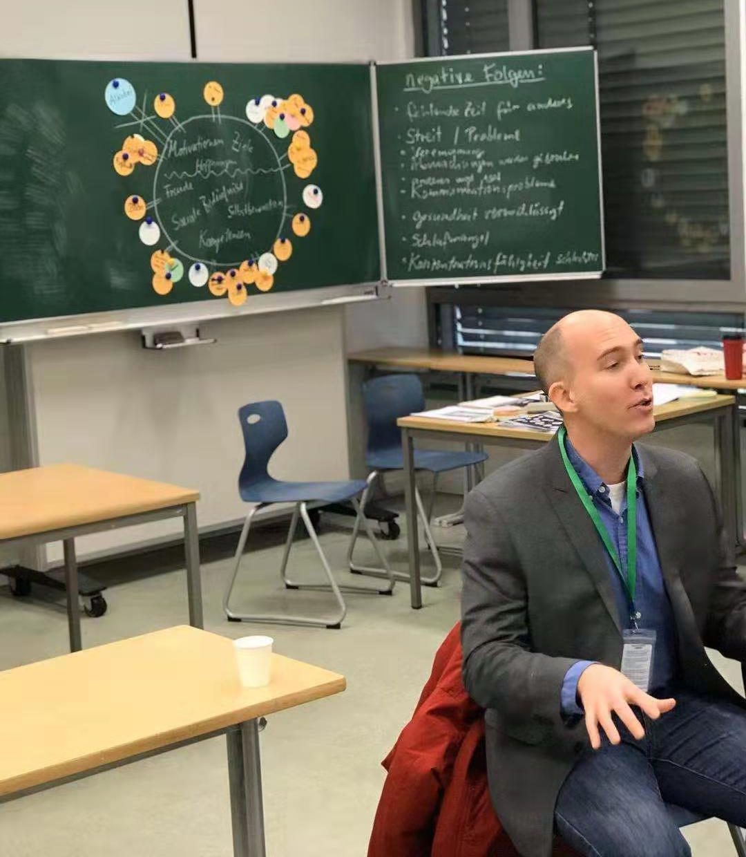 Ryan Scott Ulrich speaking to a group in a classroom